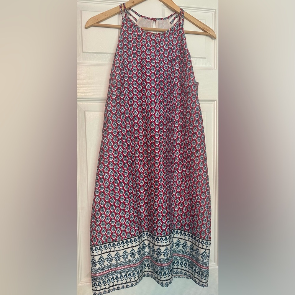 Satin like material printed knee length halter dress with belt tie in XS size